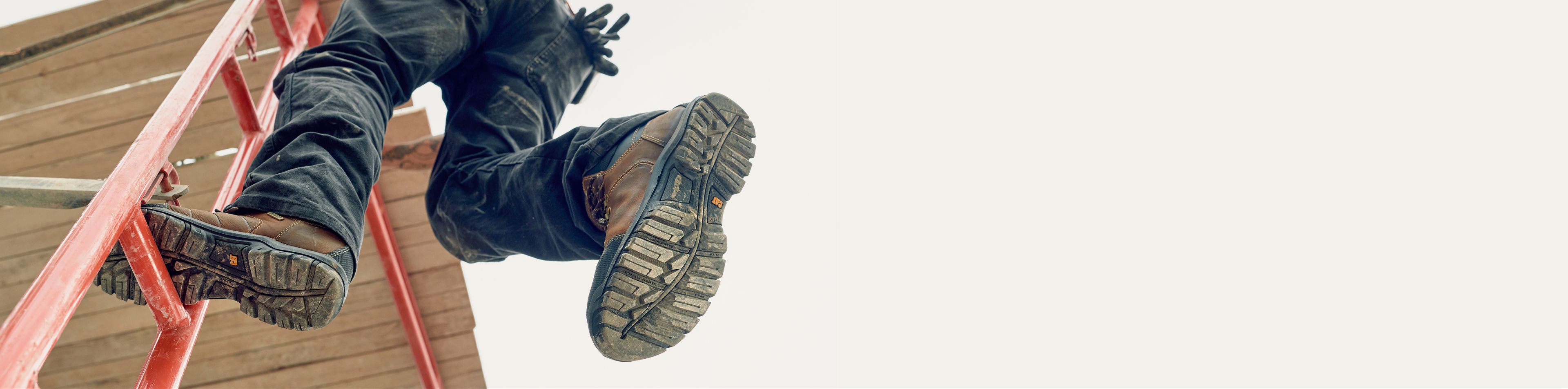 Boots climbing scaffolding.