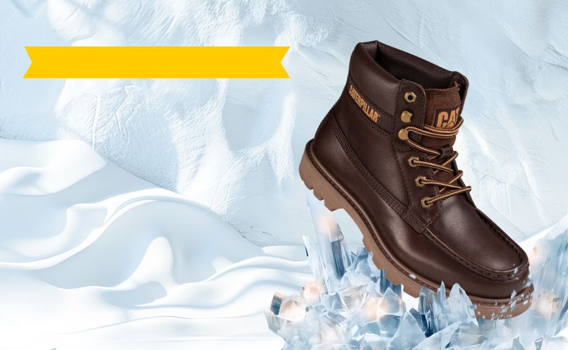 Brown boot on shards of ice.